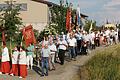 Die Fronleichnamsprozession in Schallfeld, bei der Pfarrer Stefan Mai die Hostie in der Monstranz durch Straßen und Flur trug.&nbsp;