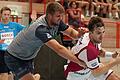 Handball-Internationales Turnier, DJK Rimpar Wölfe - HC Motor Zaporozhye       -  Da half auch hart zupacken nicht: Rimpars Michael Schulz (links) versucht, Pawel Paczkowski vom HC Motor Zaporozhye zu stoppen. Am Ende aber gewann Champions-League-Teilnehmer Motor Zaporoshye nicht nur gegen die Wölfe, sondern das Turnier.