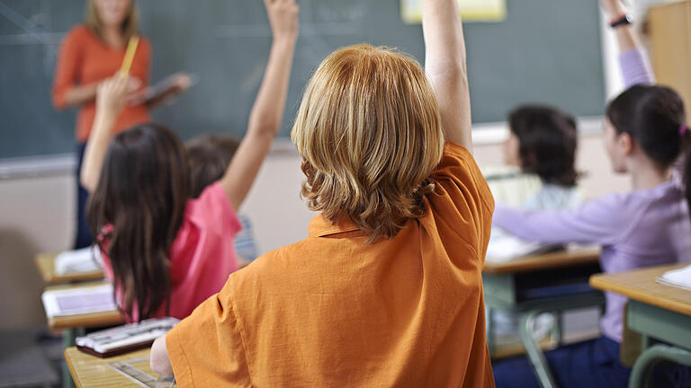 78816800 - Students Raising Hands in Classroom 78816800 - Students Raising Hands in Classroom
