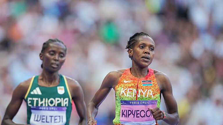 Paris 2024 - Leichtathletik - Faith Kipyegon aus Kenia wurde zum dritten Mal 1500-Meter-Olympiasiegerin. Paris 2024 - Leichtathletik - Faith Kipyegon aus Kenia wurde zum dritten Mal 1500-Meter-Olympiasiegerin.