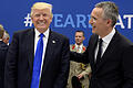 Nato-Gipfel       -  US-Präsident Donald Trump (l) lacht am 25.05.2017 im Nato-Hauptquartier in Brüssel (Belgien), während er bei einem Arbeitsessen mit Nato-Generalsekretär Jens Stoltenberg spricht.
