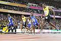 Zieleinlauf       -  Justin Gatlin (l) jubelt im Ziel über die Goldmedaille im 100-Meter-Rennen.