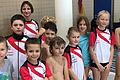 Der tüchtige Schwimmer-Nachwuchs des VfL 1860 Sportfreunde Bad Neustadt im Bad &bdquo;Die Welle&ldquo; in Haßfurt. Von links: Leonhard Näb, Karl Oehme, Richard Oehme, Danylo Kuzmenko, verdeckt Max Ungerecht, Felix Then, Laura Fingler, Hannah Then, Fabienne Schmitt und hinten Trainerin und Betreuerin Christina Voll.
