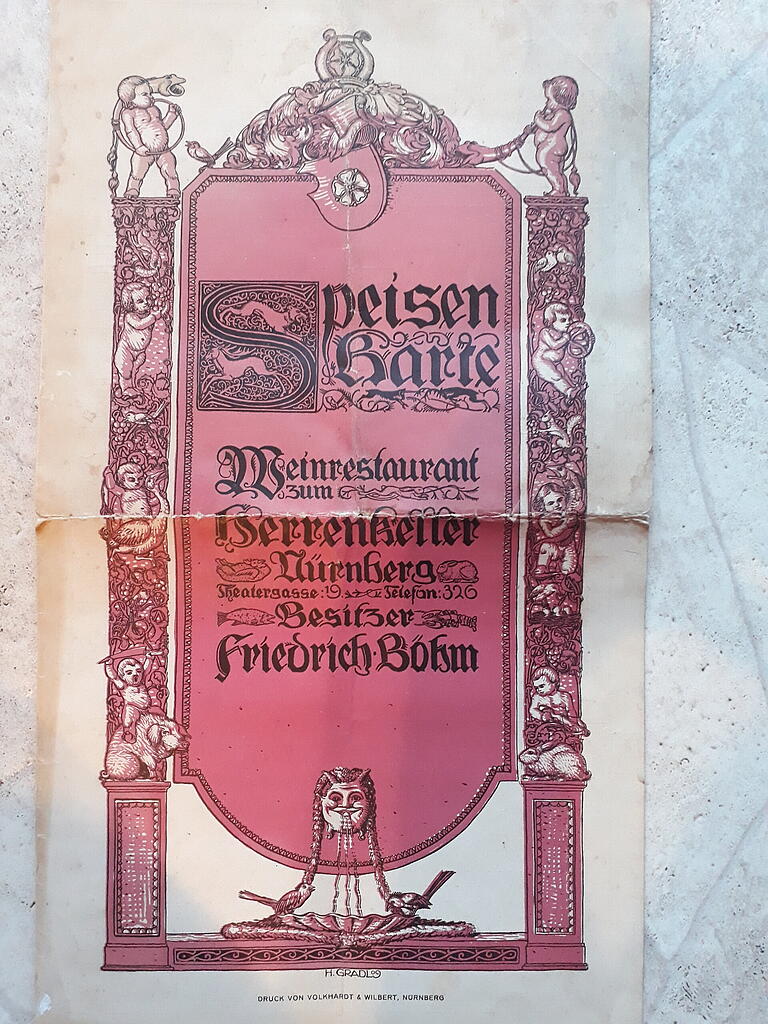 Das Deckblatt der kunstvoll gestalteten Speisekarte von 1909. Das Deckblatt der kunstvoll gestalteten Speisekarte von 1909.