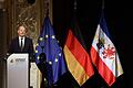 Zentrale Feier zum Tag der Deutschen Einheit       -  Kanzler Scholz findet bei seiner Festrede zum Tag der Deutschen Einheit in Schwerin mahnende, aber auch lobende Worte.