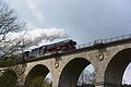Die Dampflokomotive 'Stadt Würzburg' bei einer Sonderfahrt am 24. April 2016 von Taubertal nach Fulda, hier auf dem Viadukt über die Reithwiesen bei Obersinn.