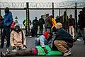 FRANCE-BRITAIN-EUROPE-MIGRANTS       -  Migrants are pictured on the Eurotunnel site near the boarding docks in Coquelles near Calais, northern France, on late July 29, 2015. One man died Wednesday in a desperate attempt to reach England via the Channel Tunnel as overwhelmed authorities fought off hundreds of migrants, prompting France to beef up its police presence. AFP PHOTO / PHILIPPE HUGUEN