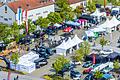 Am Samstag startete in Bad Neustadt die 11. Fahrzeugschau ­Elektromobilität. Auf dem Festplatz gab es, wie dieses Drohnenfoto zeigt, zahlreiche Elektrofahrzeuge zu begutachten.&nbsp;