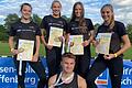 Meister von der LG Main-Spessart: die 4-x-100-Meter-Staffel mit Elena Hofmann, Marie Kohrmann, Theresa Schalling und Jana Rothaug sowie 400-Meter-Hürden-Titelträger, Nick Albrecht (vorne)