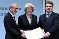 GERMANY-SWITZERLAND-ART-CRIME-HISTORY-WWII-JEWS       -  (L-R) Christoph Schaeublin, president of the Foundation of th Museum of Fine Arts in Bern, Monika Gruetters, German Culture and the Media minister, and Winfried Bausback, Bavarian State Justice Ministe, pose with a signed agreement on the late German Cornelius Gurlitt 's looted Nazi-era art collection on November 24, 2014 in Berlin. A Swiss museum said Monday it would accept a German recluse's bequest of a spectacular trove of more than 1,000 artworks hoarded during the Nazi era. AFP PHOTO / RONNY HARTMANN