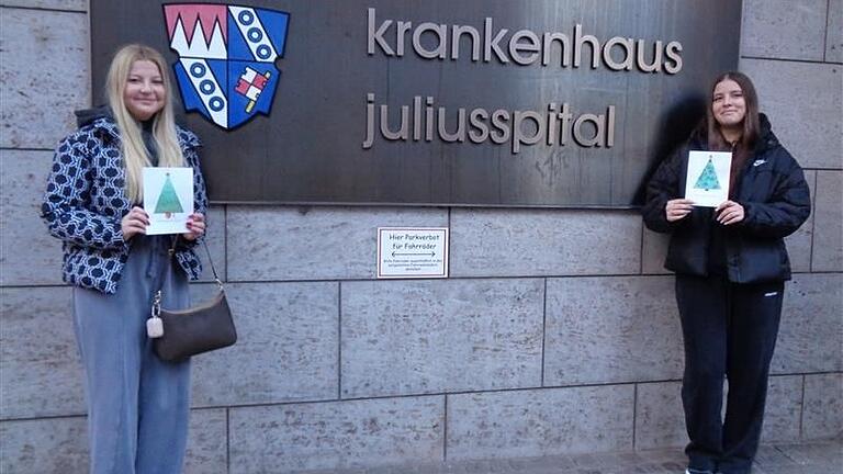 Bei der Übergabe der Weihnachtskarten an die Stiftung Juliusspital. Bei der Übergabe der Weihnachtskarten an die Stiftung Juliusspital.