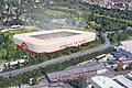 So könnte das neue Kickersstadion von Süden aus aussehen. Im Vordergrund verläuft die Bundesstraße 19 hoch zur Autobahnanschlussstelle Würzburg-Heidingsfeld.